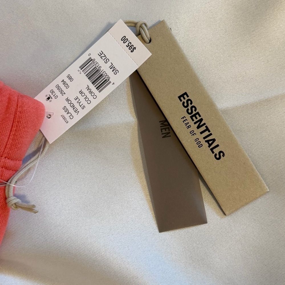FEAR OF GOD ESSENTIALS - Tapered Logo Blend Jersey Sweatpants in Coral - Picture 8 of 11